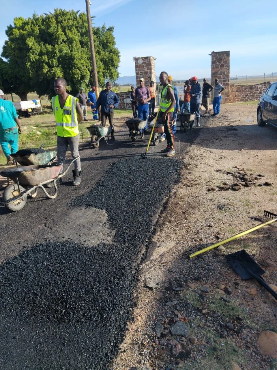 Precision asphalt laying over a prepared base