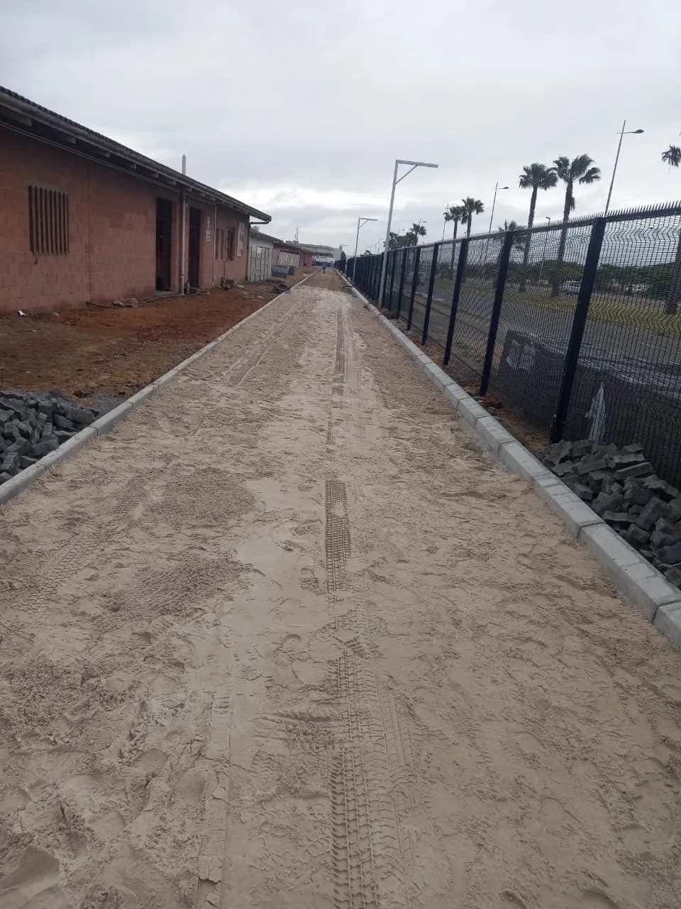 Base preparation for a pedestrian walkway